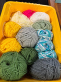 Bundle of Wool Balls and Knitting Needles