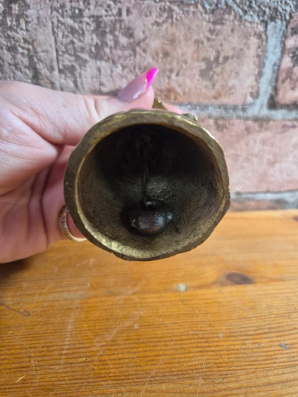 Brass bell lady