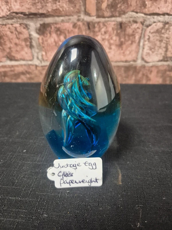 Blue egg shaped paperweight