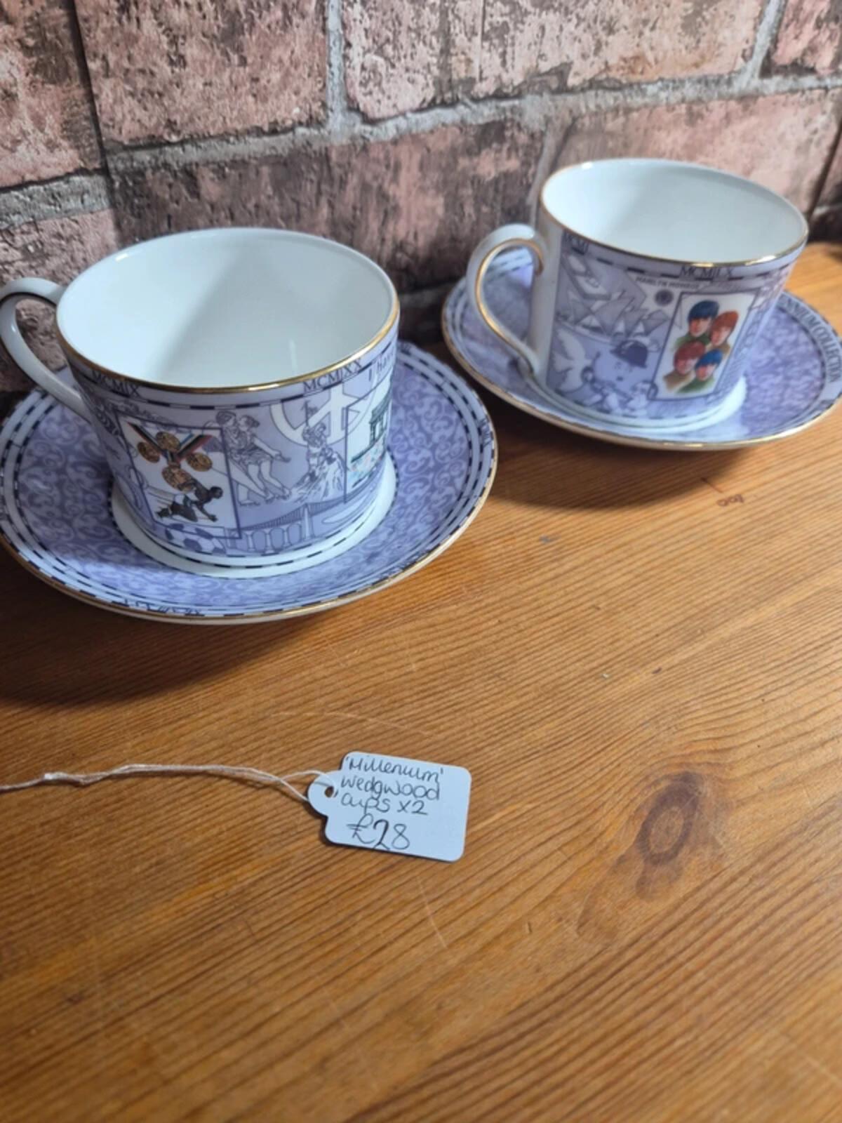 Wedgwood 'Millennium' cups and saucers set