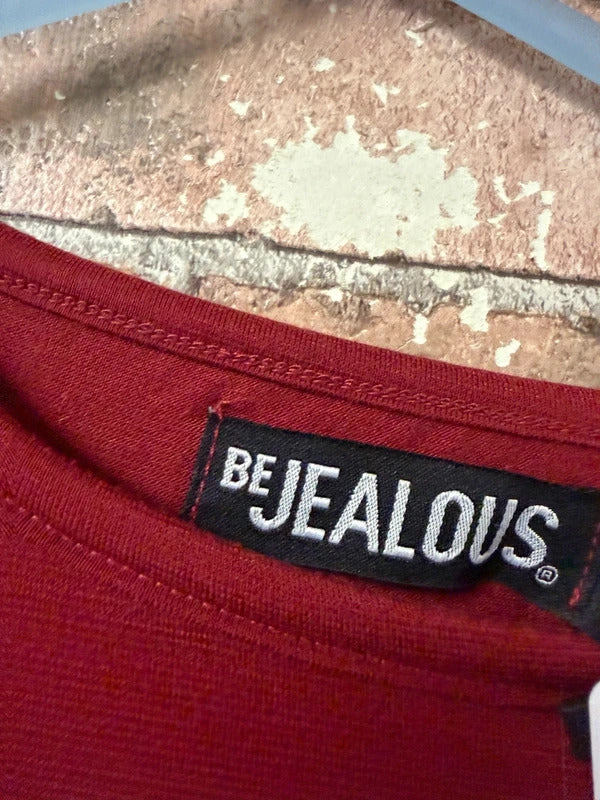 Be Jealous burgundy top - size 20