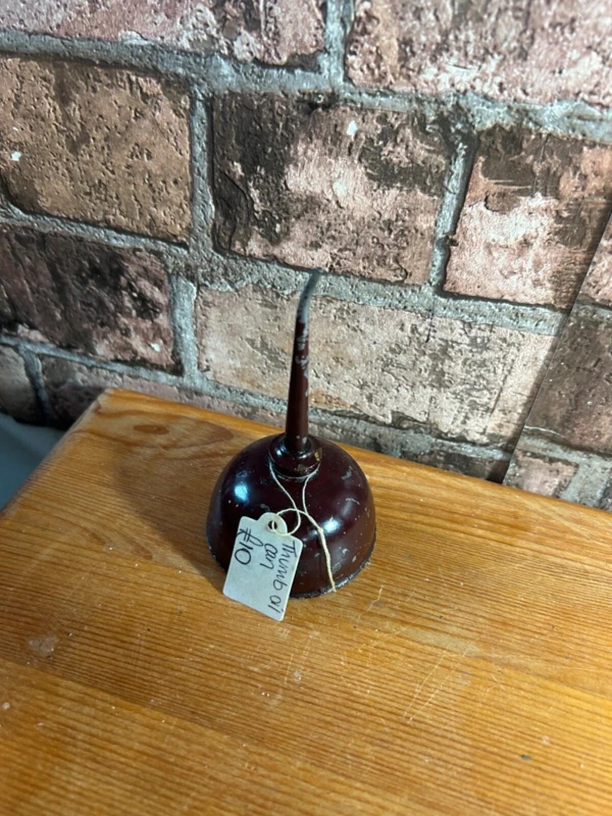 Vintage Thumb Oil Can