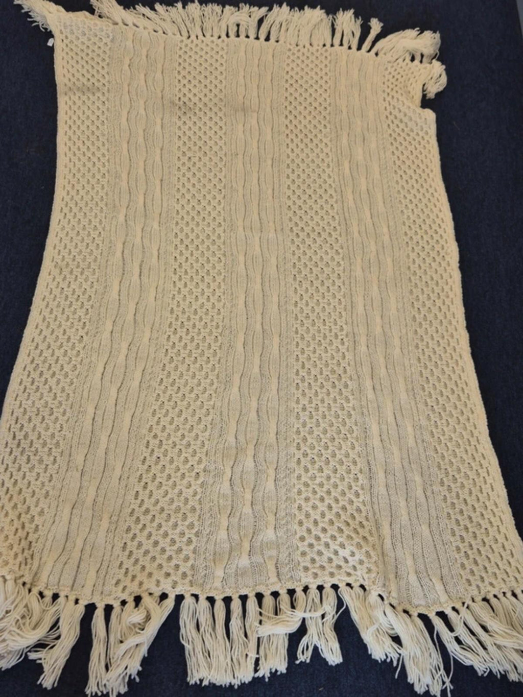 Large cream knit blanket