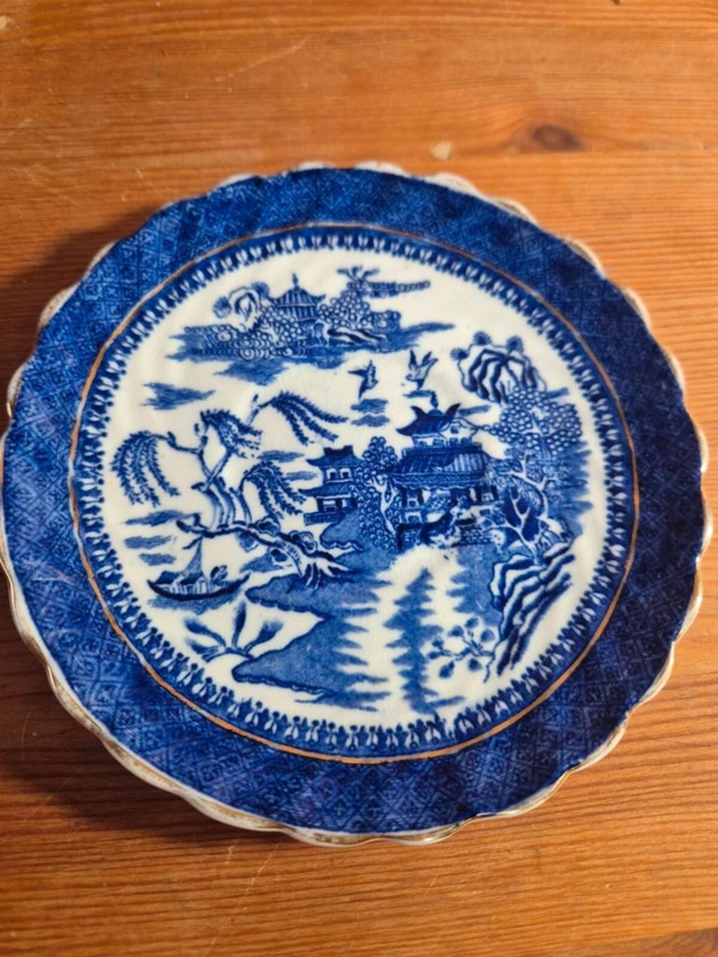 Antique blue and white willow cup & saucers