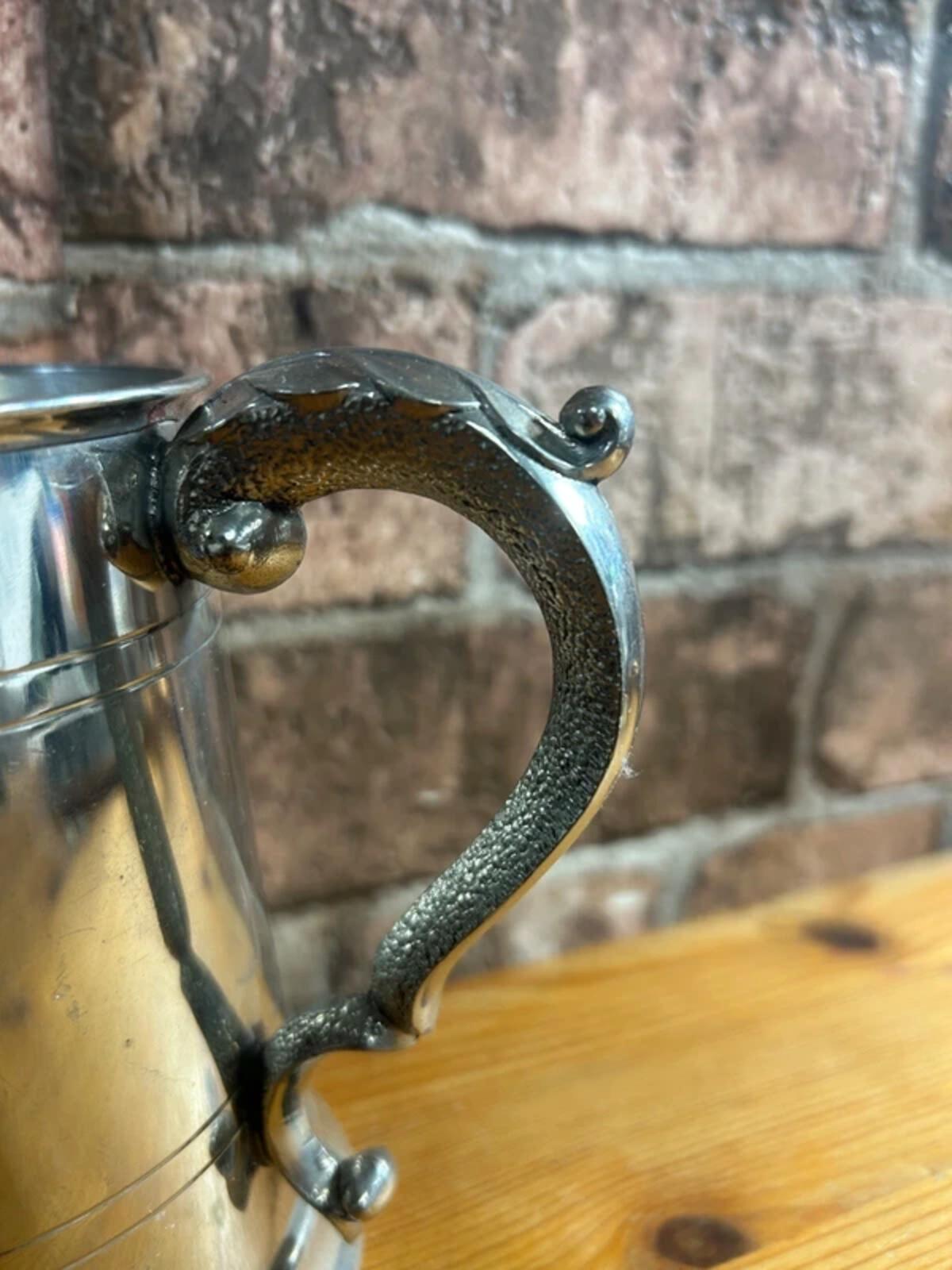 Vintage Pewter Tankard with Intricate Handle