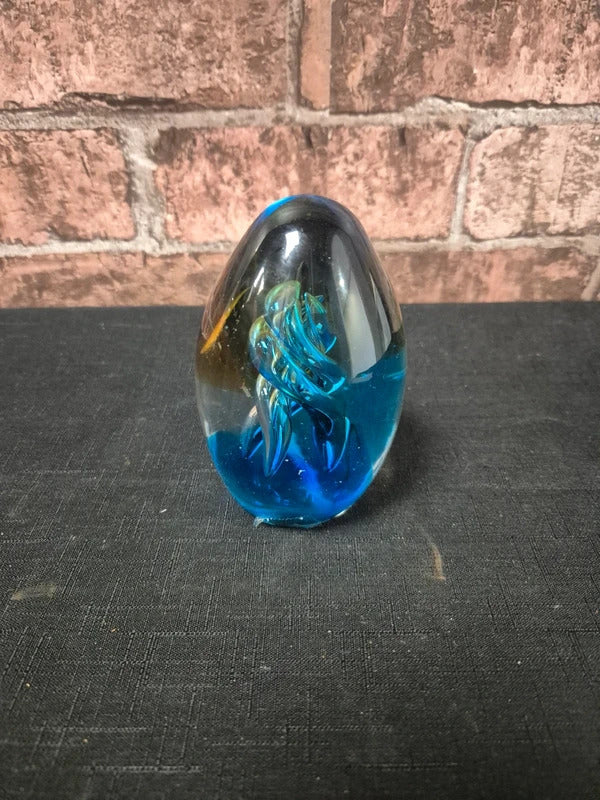 Blue egg shaped paperweight