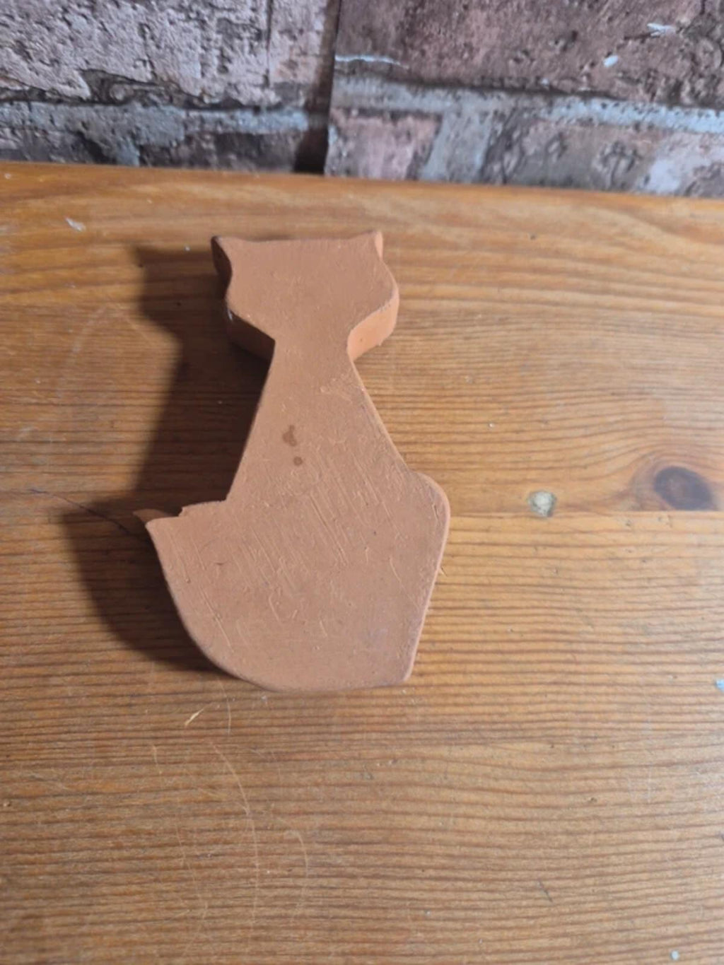 Terracotta stoneware cat figure