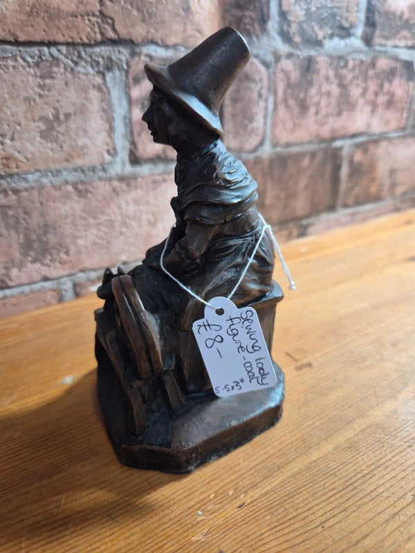 Sewing lady coal figure