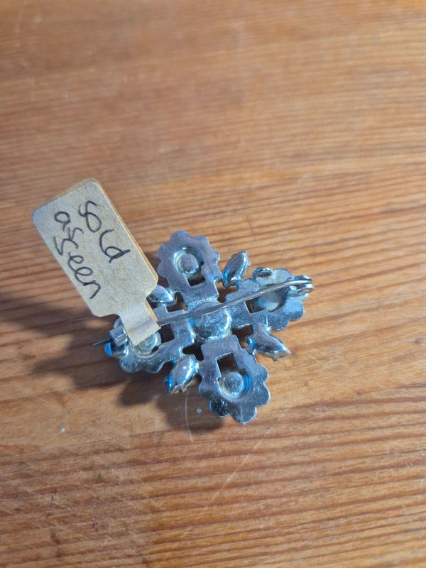 Silver tone brooch