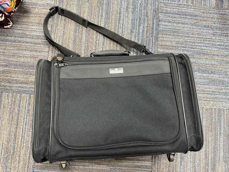 Samsonite Black Luggage Bag on wheels
