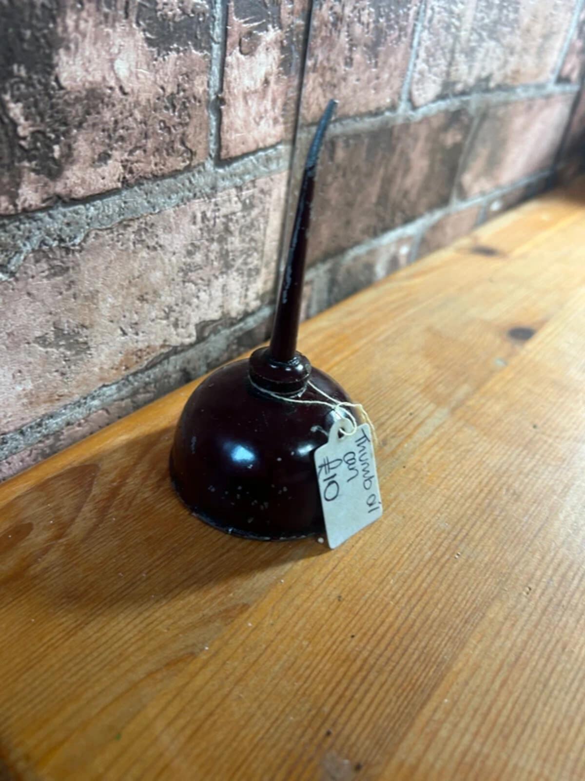Vintage Thumb Oil Can