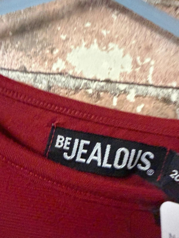 Be Jealous burgundy top - size 20