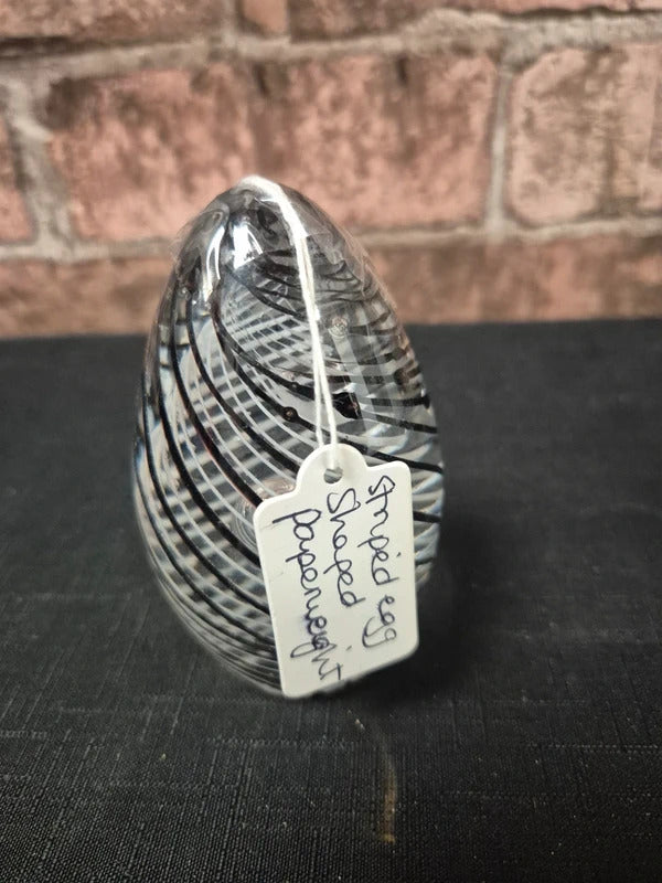 Striped egg shape paperweight