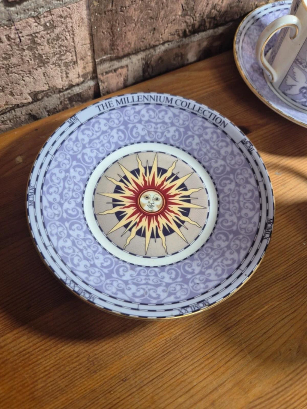 Wedgwood 'Millennium' cups and saucers set