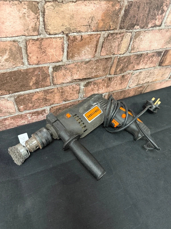 Challenge Corded Hammer Drill with Wire Brush Attachment