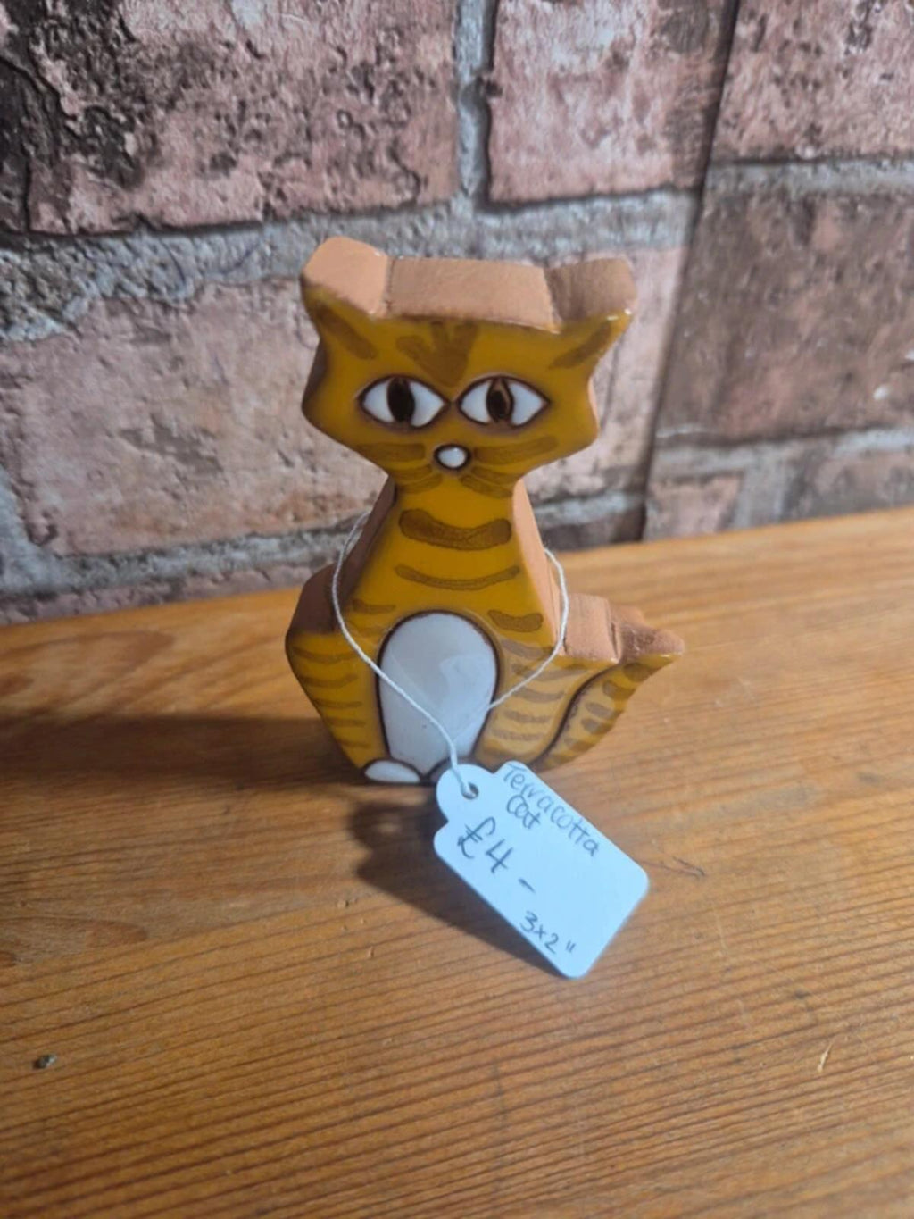 Terracotta stoneware cat figure