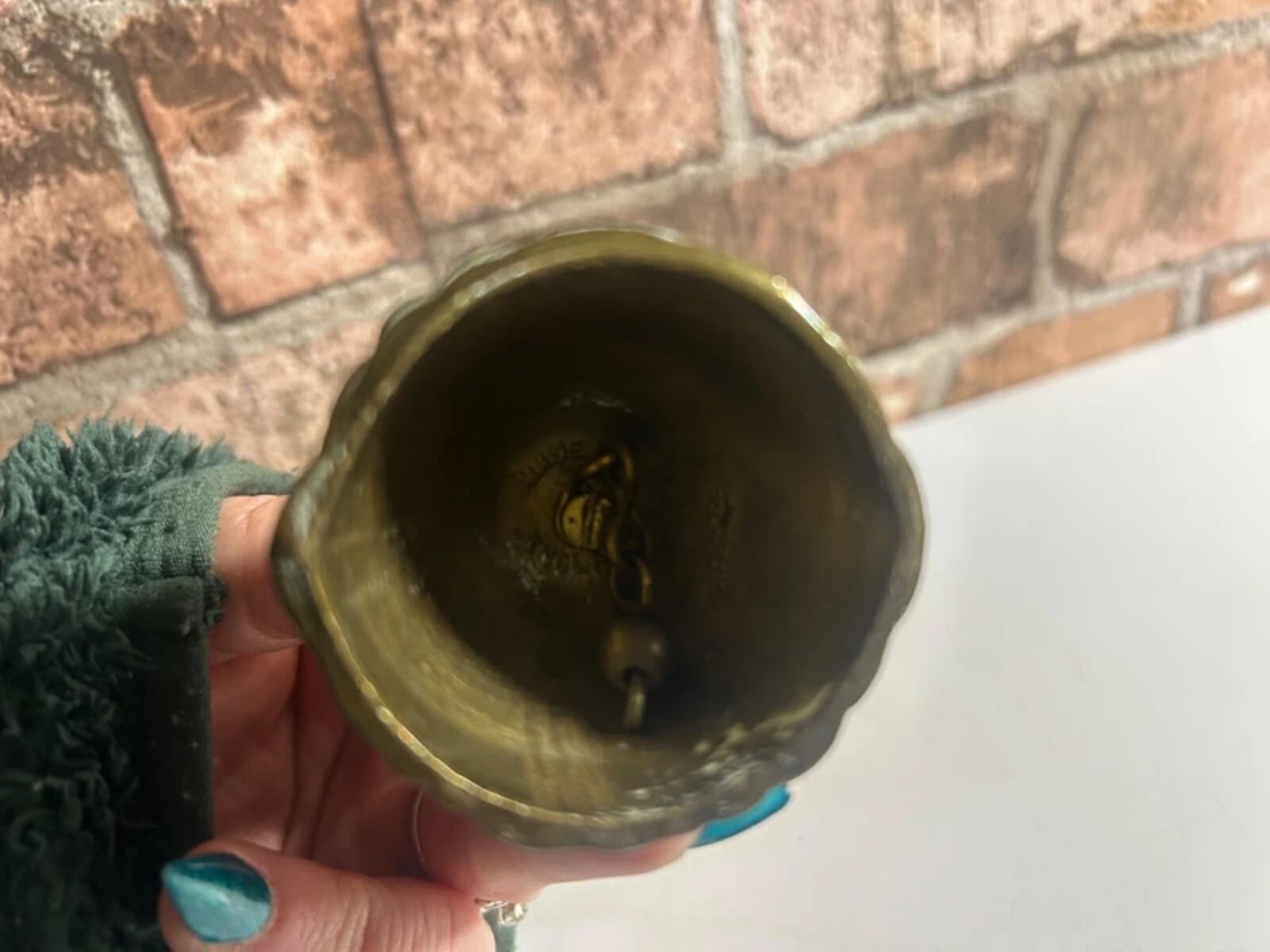 Vintage brass bell lady