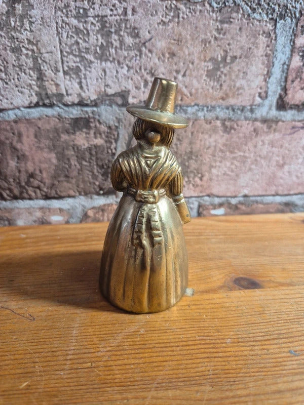 Brass bell lady