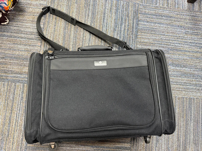 Samsonite Black Luggage Bag on wheels