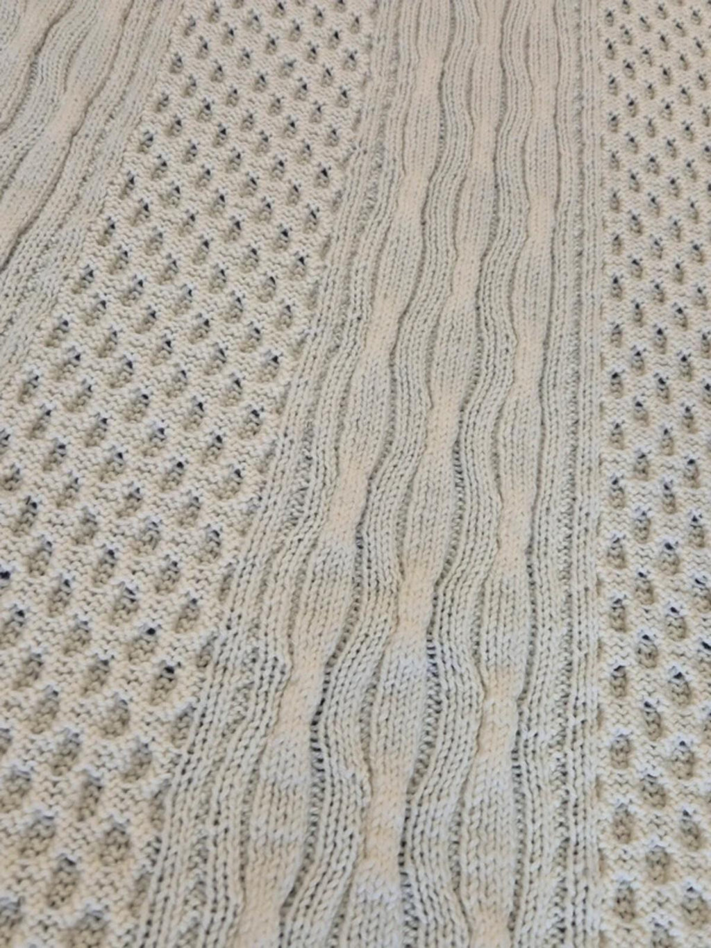 Large cream knit blanket