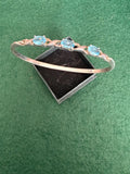 Sterling Silver and Blue Topaz Open Bangle