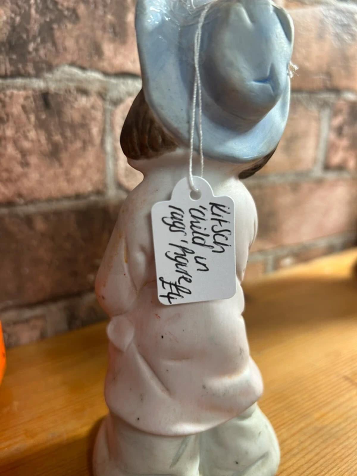 Kitsch Child in Rag Ceramic Figure