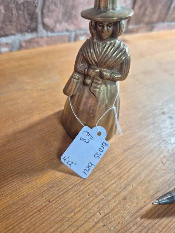 Brass bell lady