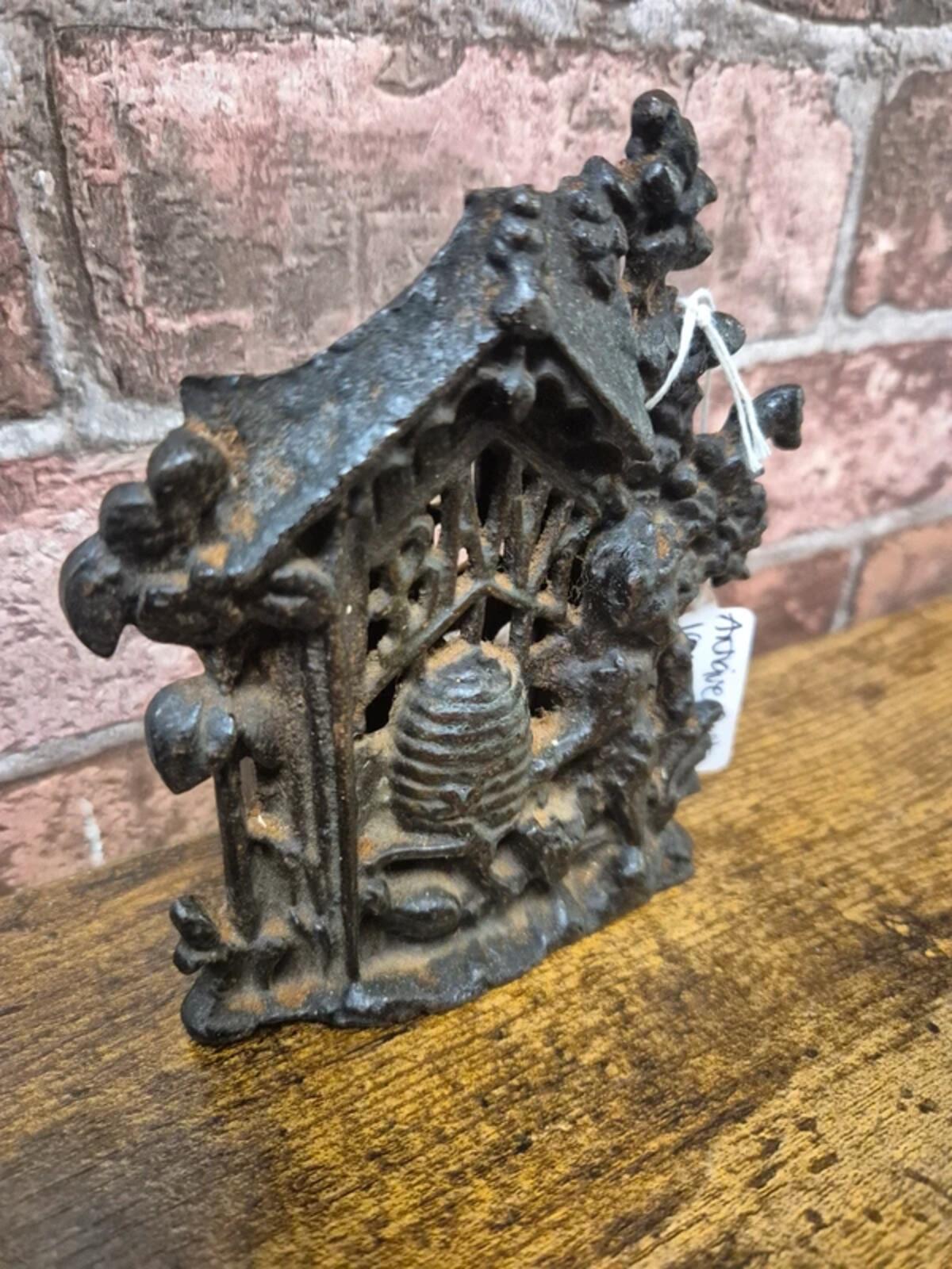 Antique Cast iron 'bear & hive' money box
