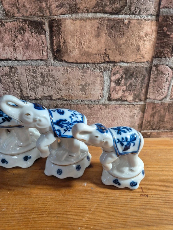 Set of 3 blue and white elephants