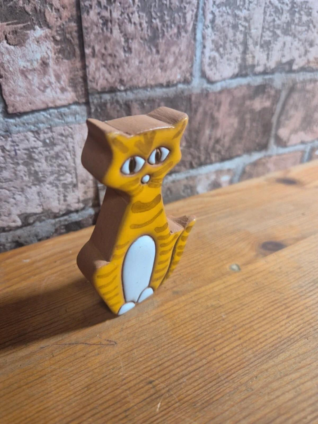 Terracotta stoneware cat figure