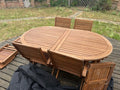 Solid Teak Extending Garden Table and Eight Folding Chairs