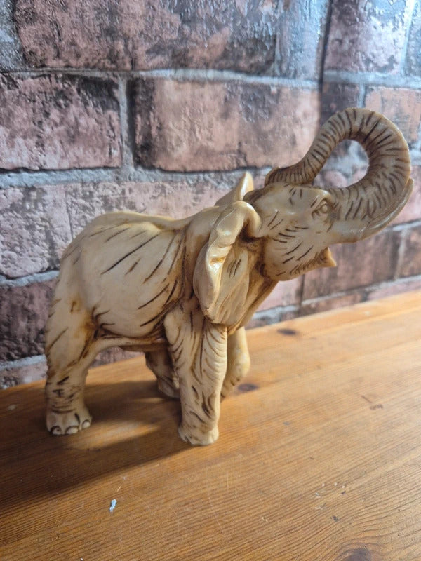 Faux ivory style resin elephant