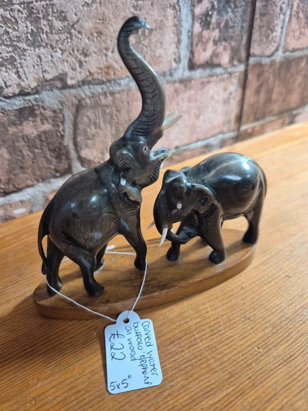 Carved water buffalo elephant on wood base