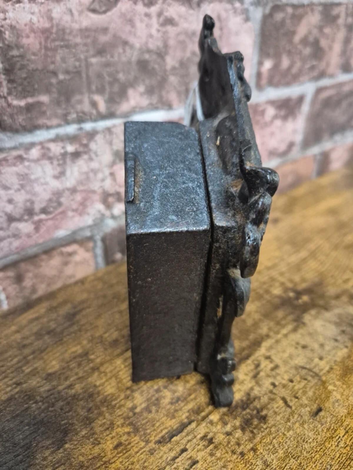Antique Cast iron 'bear & hive' money box