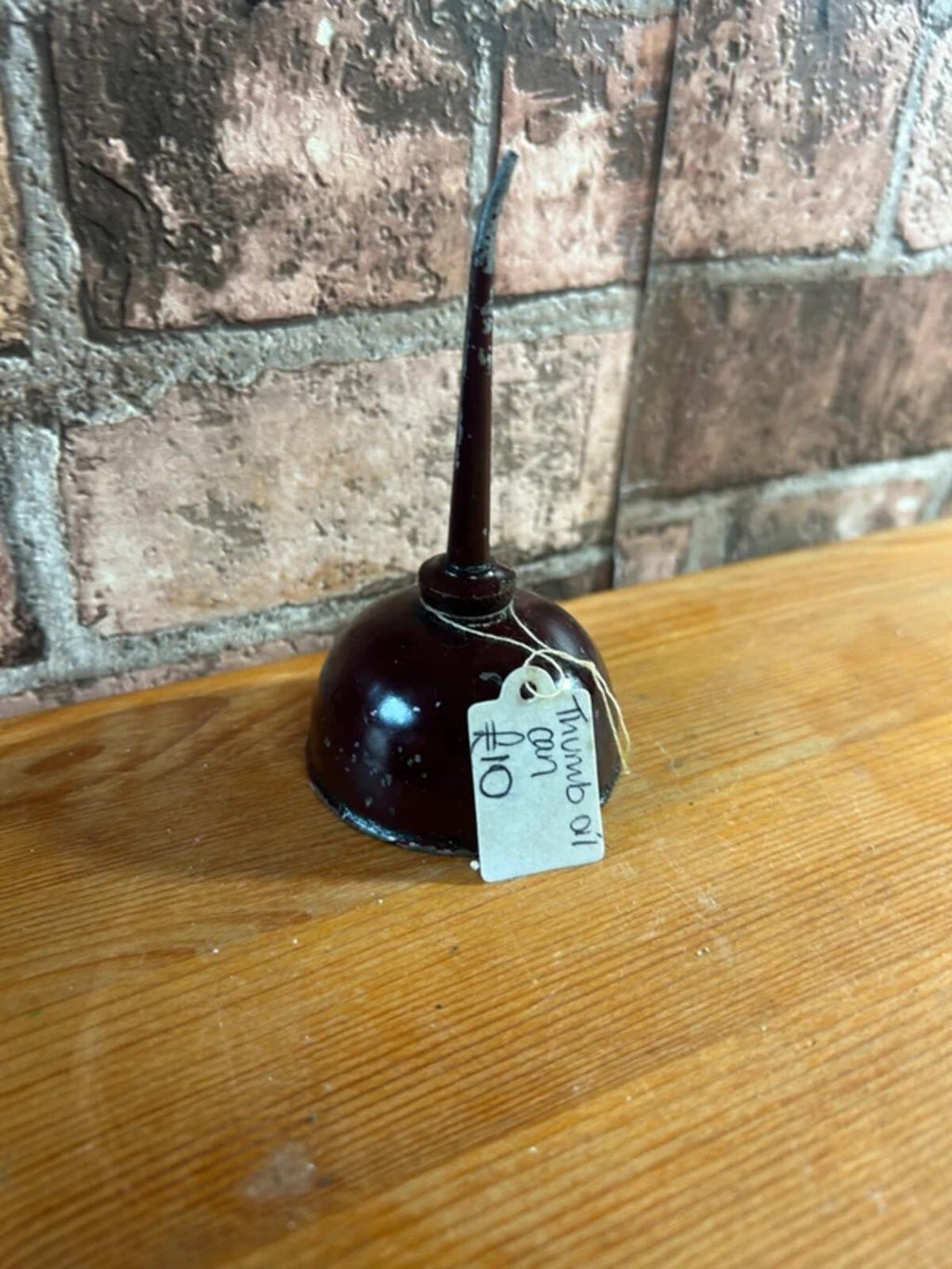 Vintage Thumb Oil Can