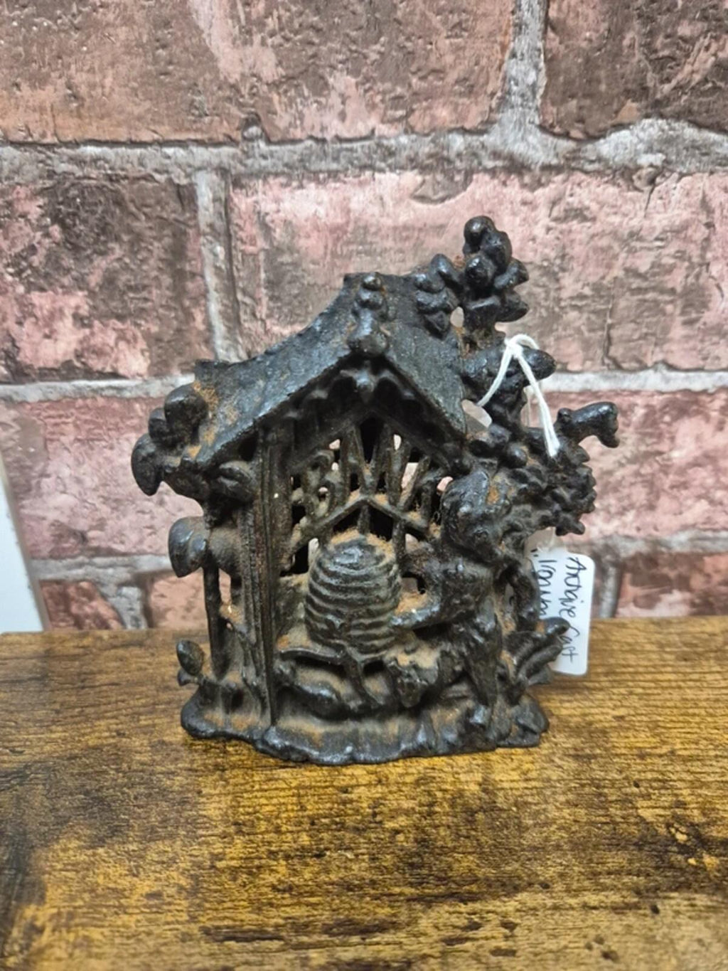 Antique Cast iron 'bear & hive' money box