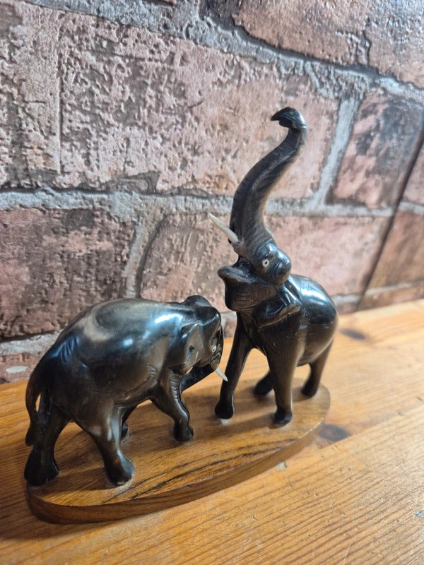 Carved water buffalo elephant on wood base