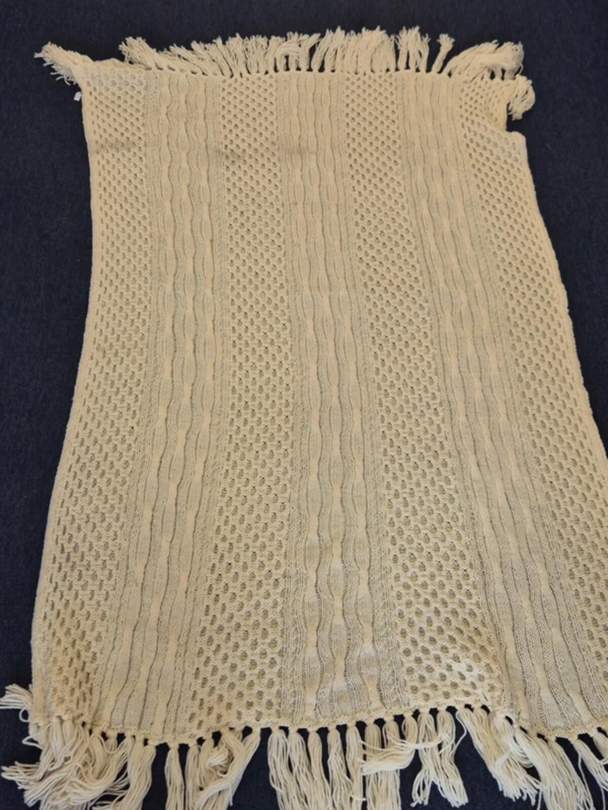 Large cream knit blanket