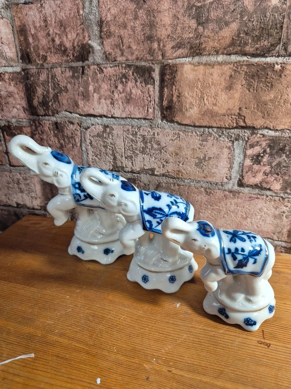 Set of 3 blue and white elephants