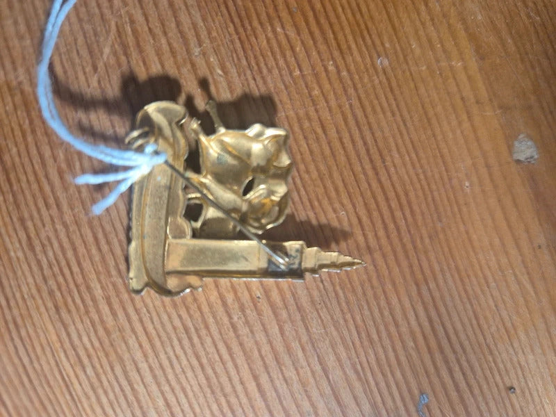 Bull fighter brooch